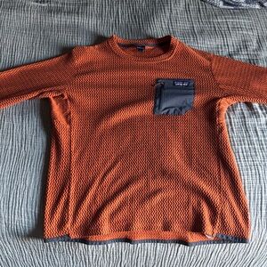 Orange Sweater with Pocket Detail